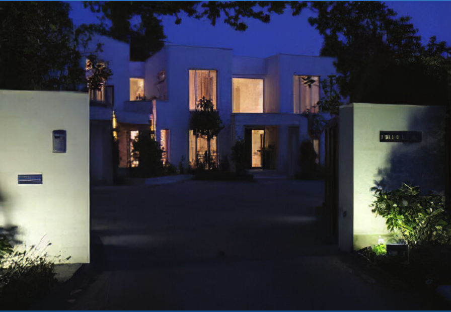 Illuminated home entrance at night