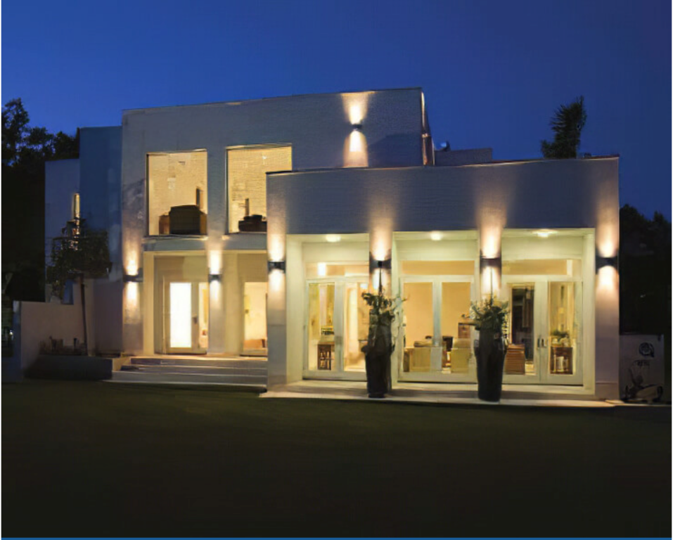 Modern home illuminated at night
